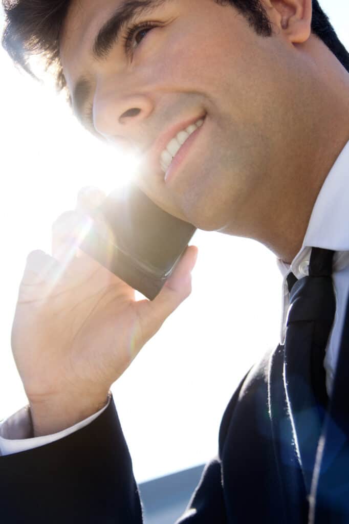 Business Man Talking on Smartphone